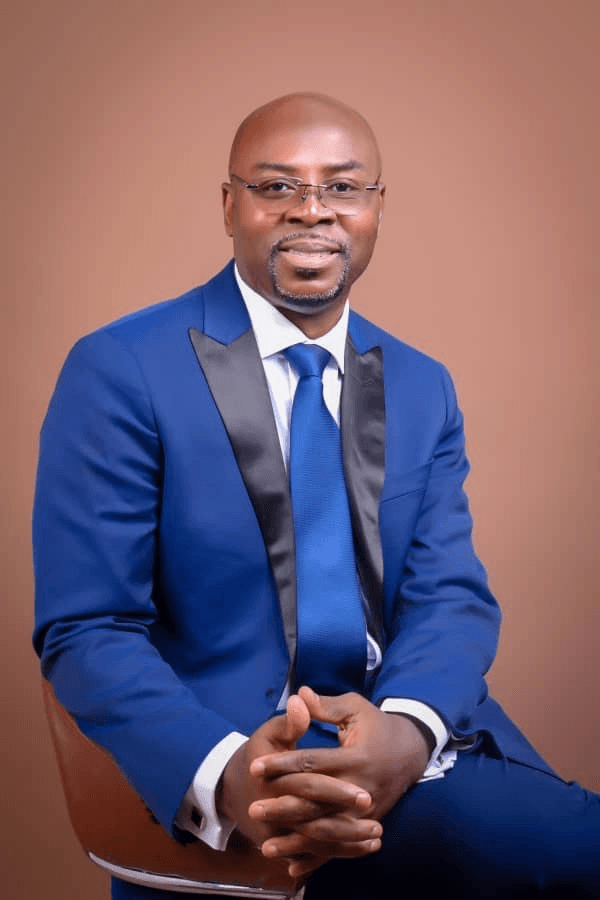 Dr. Eugene Dordoye — Board Chairperson